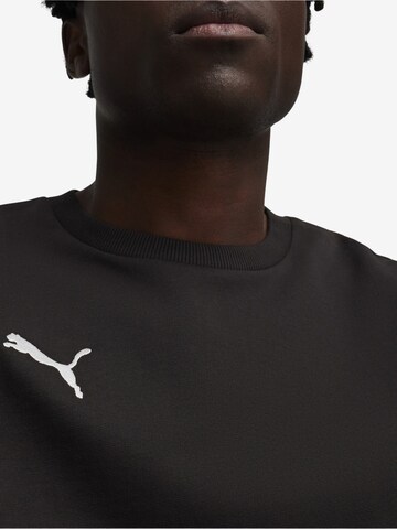 PUMA Športna majica 'TeamGoal' | črna barva