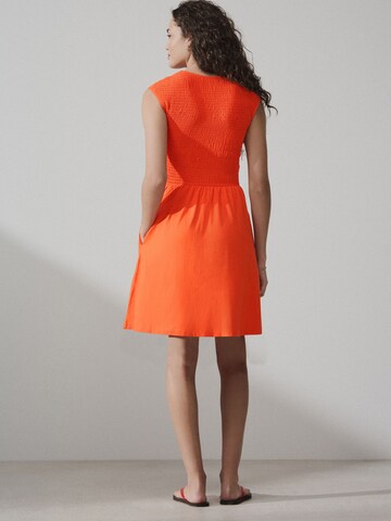Robe Next en orange
