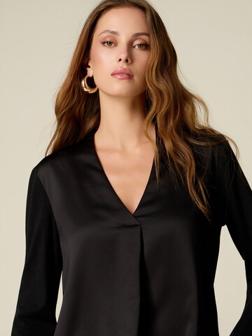 Camicia da donna di oltre in nero