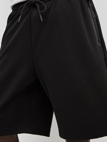 Pull&Bear Zvonové kalhoty Kalhoty – černá