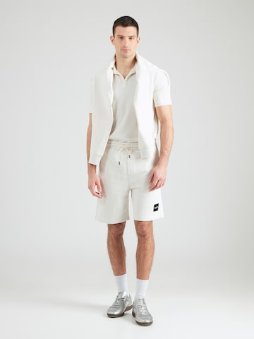 HUGO Loosefit Παντελόνι 'Darix' σε μπεζ