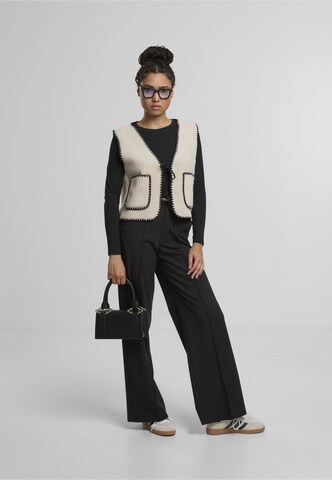 Noisy may Vesta 'NMFuzzy' – béžová