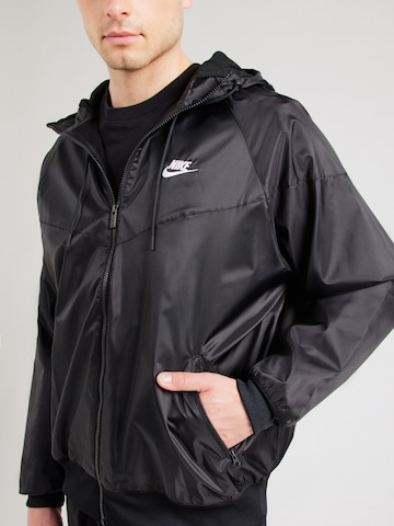 Geacă de primăvară-toamnă 'Heritage Essentials' de la Nike Sportswear pe negru