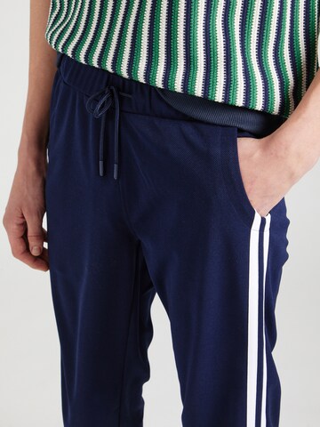 Sergio Tacchini Zwężany krój Spodnie 'NEW YOUNG' w kolorze niebieski