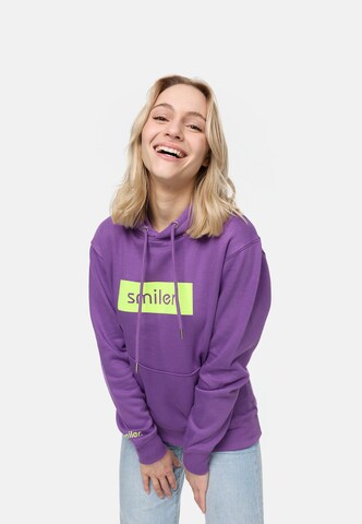 Sweat-shirt smiler. en violet