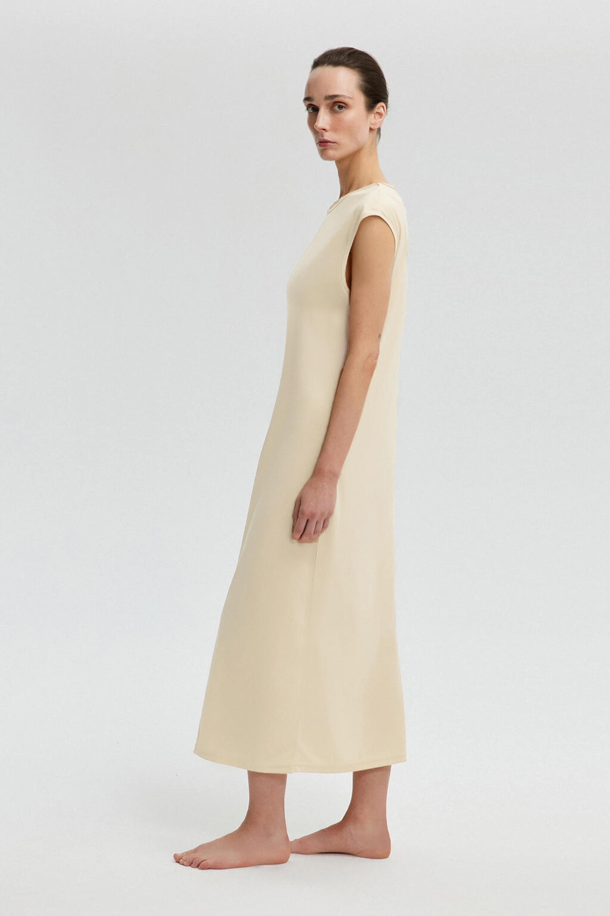 Touche Prive Jurk in Beige: voorkant