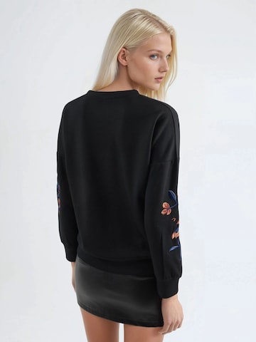 Sweat-shirt Hiccup en noir