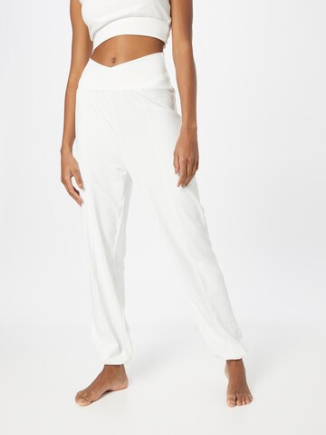 CURARE Yogawear Tapered Workout Pants in White: front
