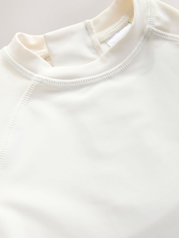 Next UV-skydd i beige