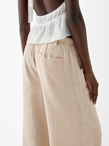 Bershka Wide leg Byxa i beige