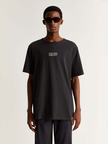 Scalpers T-shirt i svart: framsida