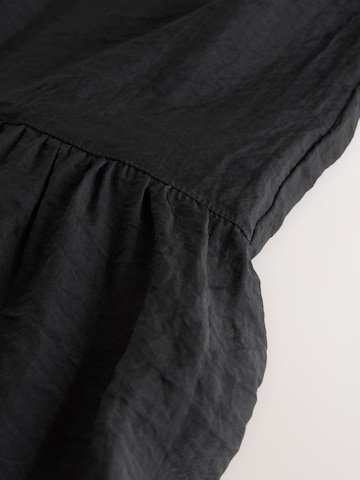 Robe Next en noir