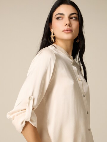 Camicia da donna di oltre in bianco