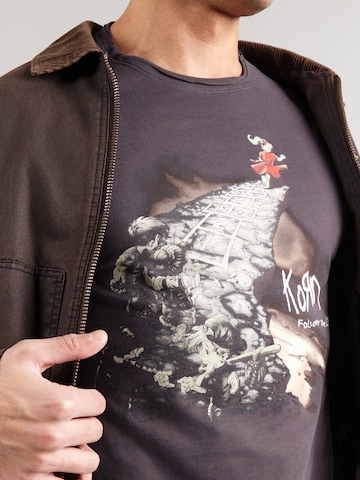 AMPLIFIED Koszulka 'KORN - FOLLOW THE LEADER' w kolorze szary