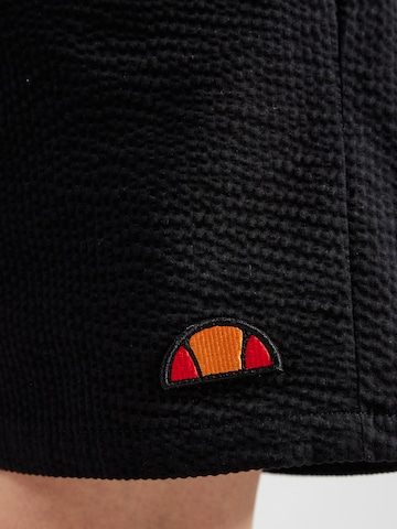 ELLESSE Voľný strih Nohavice 'Cnyk' - Čierna