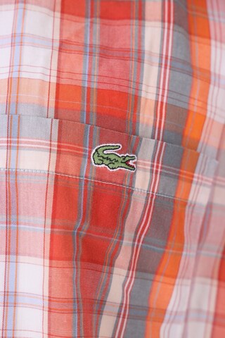 LACOSTE Button Up Shirt in L in Orange