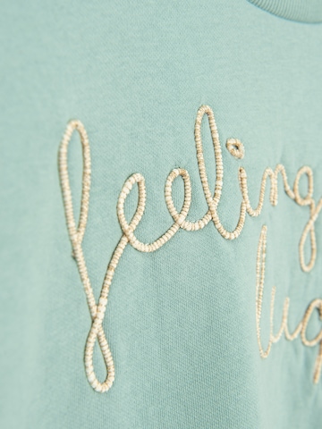 Sweat-shirt Cool Club en bleu