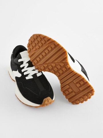 Baskets Next en noir