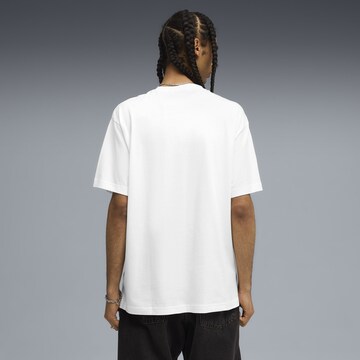 T-Shirt 'World Tour' PUMA en blanc