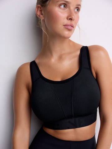 Next Бюстие Спортен сутиен в черно: отпред