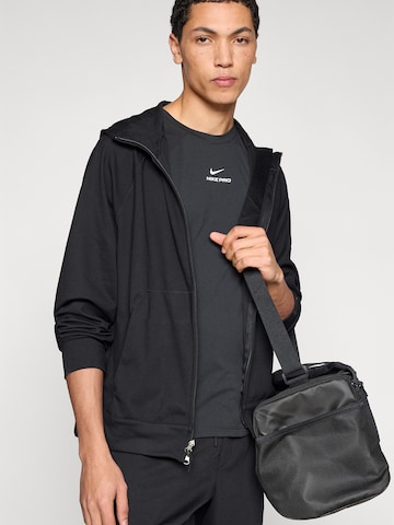 Giacca di felpa sportiva di NIKE in nero