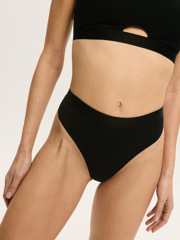 Panty 'Slip Bianco, nahtlos, lasergeschnittene Kanten, hoher Beinausschnitt' di ESOTIQ in nero: frontale