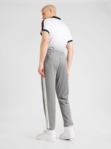 ELLESSE - regular Pantalón en gris
