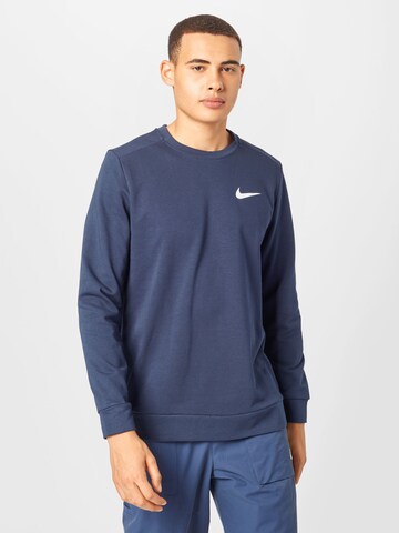 Sweat de sport NIKE en bleu : devant