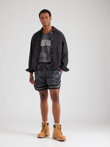 regular Pantaloni di NEW ERA in nero