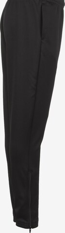 Regular Pantalon de sport 'Teamrise' PUMA en noir