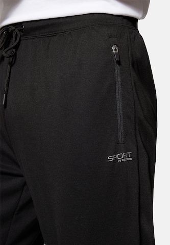 Effilé Pantalon Stooker Men en noir