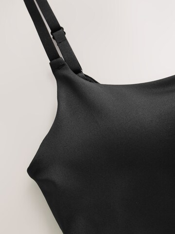 Top de la Next pe negru