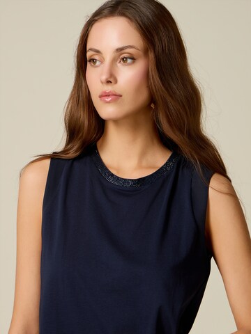 Top di oltre in blu