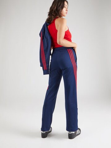 ADIDAS SPORTSWEAR - Bootcut Pantalón deportivo 'Iconic' en azul