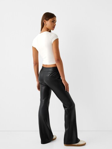 Bershka Flared Trousers with creases in Black