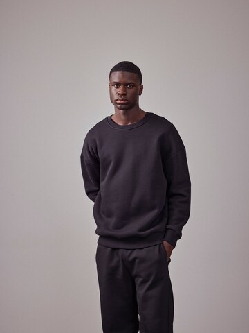 DAN FOX APPAREL Sweatshirt 'The Essential' in Schwarz: predná strana