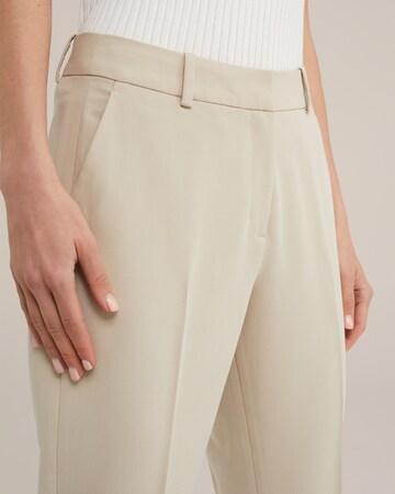 WE Fashion Slim fit Trousers in Beige