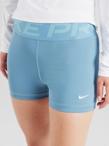 NIKE Skinny Športne hlače | modra barva: sprednja stran