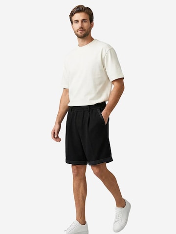 Tommy Life Hose‌ in Schwarz