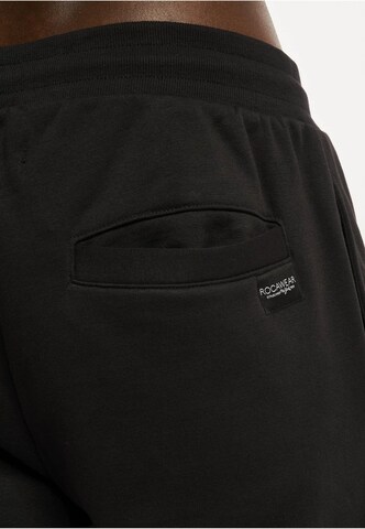 ROCAWEAR Tapered Trousers in Black