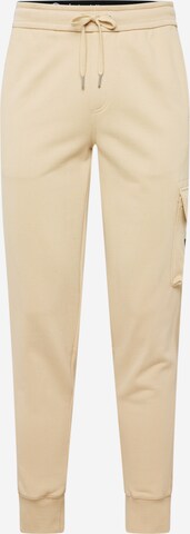 Calvin Klein Jeans - Tapered Pantalón cargo en beige: frente