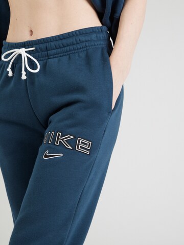 Nike Sportswear Zwężany krój Spodnie 'PHNX FLC' w kolorze niebieski