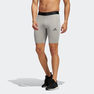 ADIDAS SPORTSWEAR - Skinny Calças de desporto em cinzento: frente