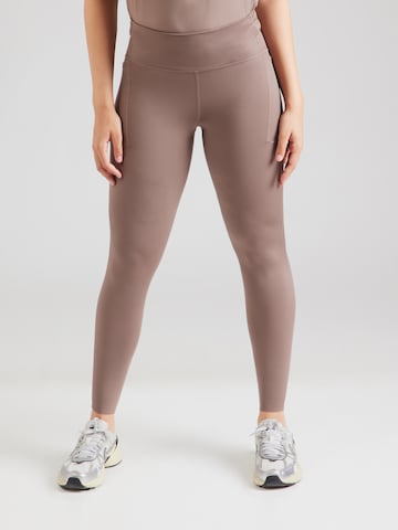 Skinny Pantalon de sport NIKE en marron : devant