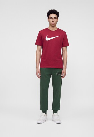 Nike Sportswear Tapered Hose 'CLUB' in Grün