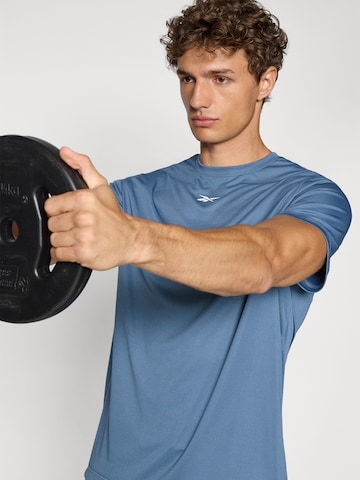 Tricou funcțional 'ID TRAIN' de la Reebok pe albastru