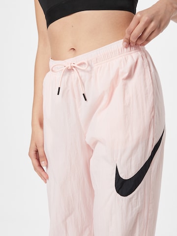 Nike Sportswear Конический (Tapered) Штаны 'Essential' в Ярко-розовый