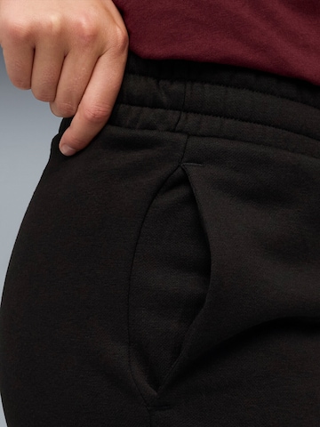 PUMA - regular Pantalón deportivo 'Puma Ess Metallic Sweatpants Fl' en negro