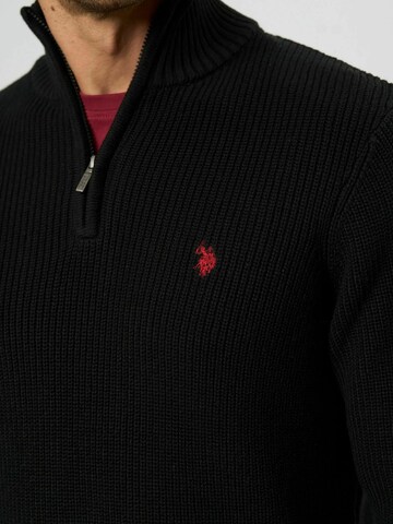 U.S. POLO ASSN. Neulepaita 'Rafael' värissä musta