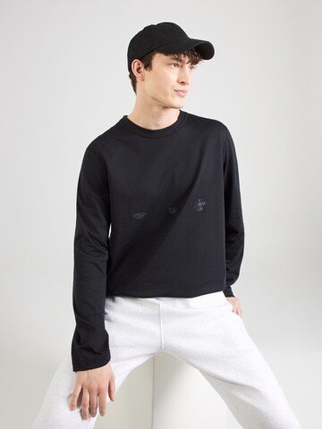 NIKE Koszulka funkcyjna 'Primary' w kolorze czarny: przód